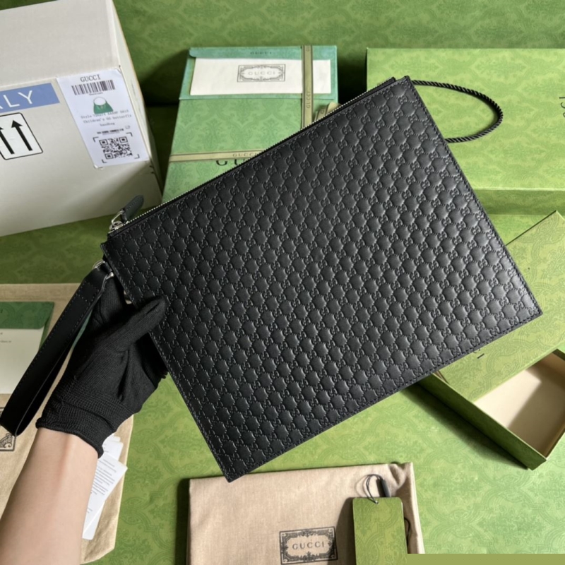 G*u*i clutch bags